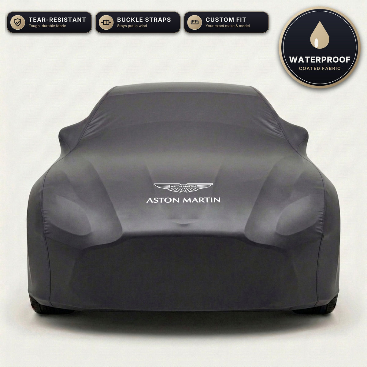 Black Aston Martin outdoor car cover, waterproof and custom fit, with printed Aston Martin logo