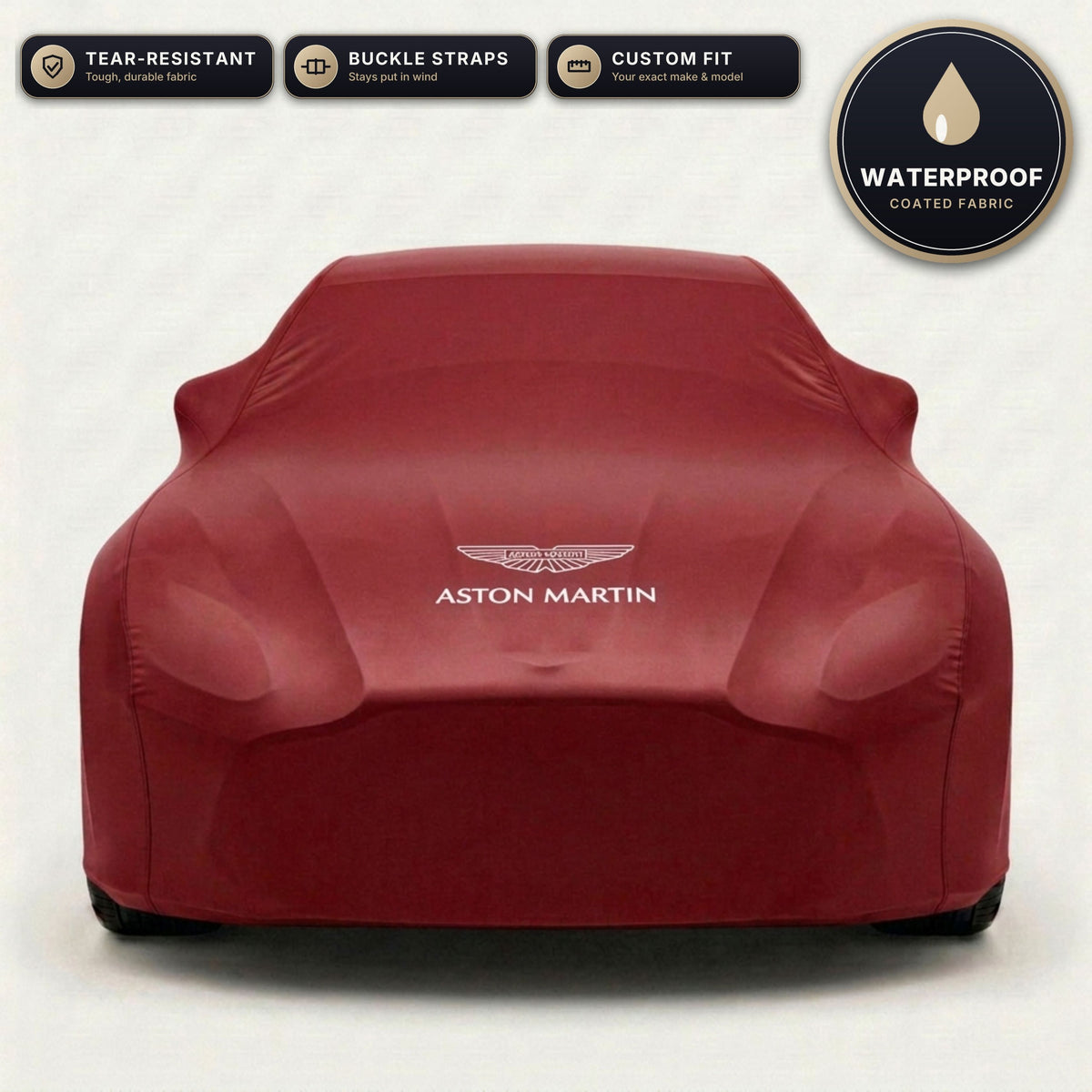 Red Aston Martin outdoor car cover, waterproof and custom fit, with printed Aston Martin logo