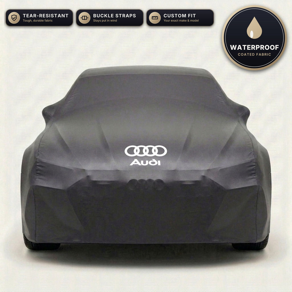 Black Audi outdoor car cover, waterproof and custom fit, with printed Audi logo