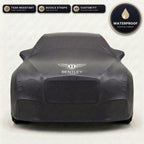 Black Bentley outdoor car cover, waterproof and custom fit, with printed Bentley logo