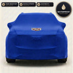 Blue Cadillac outdoor car cover, waterproof and custom fit, with printed Cadillac logo