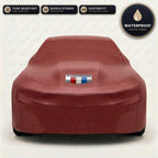 Red Chevrolet Camaro outdoor car cover, waterproof and custom fit, with printed Camaro logo