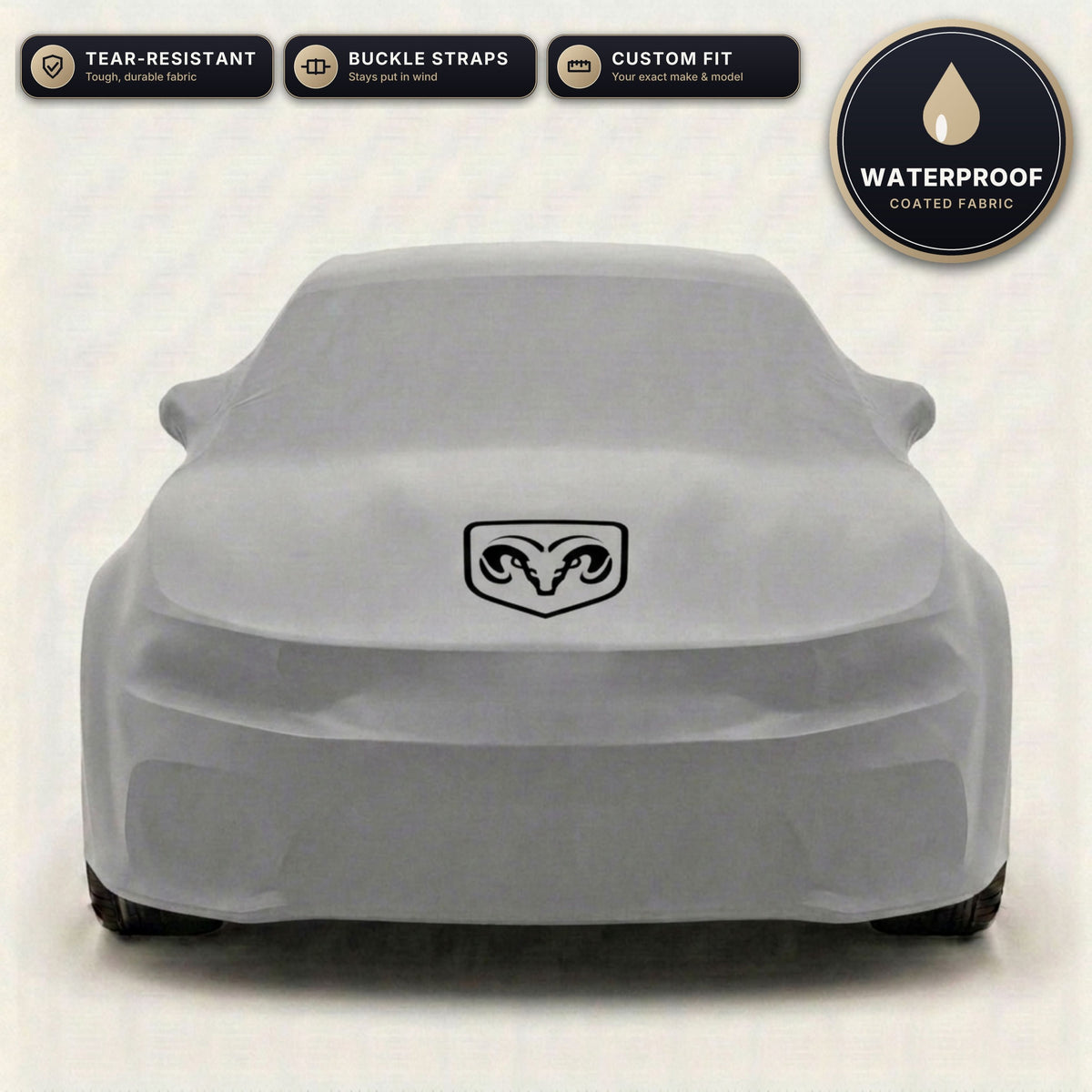 Gray Dodge outdoor car cover, waterproof and custom fit, with printed Dodge logo