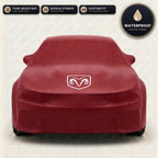 Red Dodge outdoor car cover, waterproof and custom fit, with printed Dodge logo
