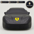 Black Ferrari outdoor car cover, waterproof and custom fit, with printed Ferrari logo