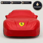 Red Ferrari outdoor car cover, waterproof and custom fit, with printed Ferrari logo