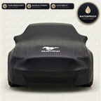 Black Ford Mustang outdoor car cover, waterproof and custom fit, with printed Mustang logo