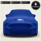 Blue Ford Mustang outdoor car cover, waterproof and custom fit, with printed Mustang logo