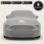 Gray Ford Mustang outdoor car cover, waterproof and custom fit, with printed Mustang logo