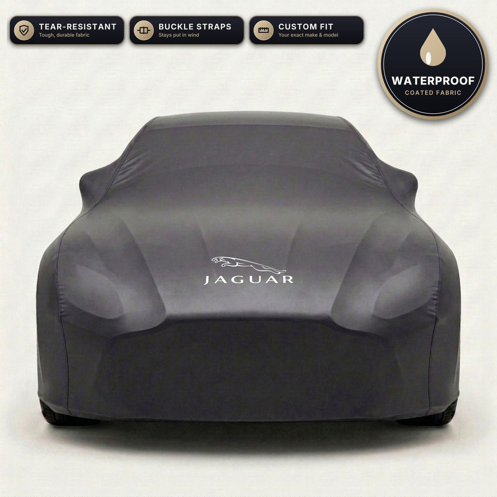 Black Jaguar outdoor car cover, waterproof and custom fit, with printed Jaguar logo