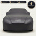 Black Jaguar outdoor car cover, waterproof and custom fit, with printed Jaguar logo