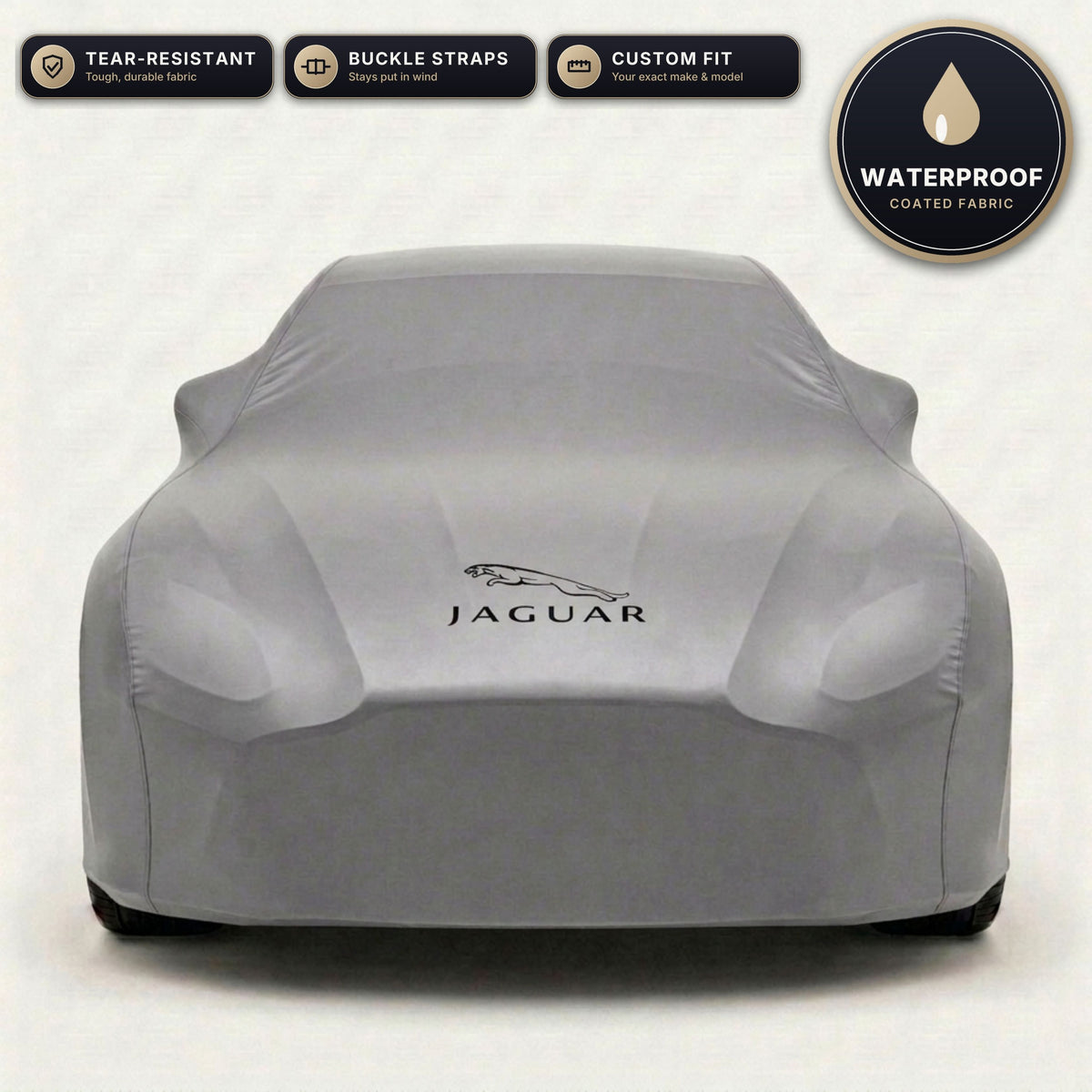 Gray Jaguar outdoor car cover, waterproof and custom fit, with printed Jaguar logo