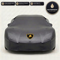 Black Lamborghini outdoor car cover, waterproof and custom fit, with printed Lamborghini logo