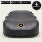 Black Lamborghini outdoor car cover, waterproof and custom fit, with printed Lamborghini logo
