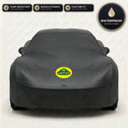 Black Lotus outdoor car cover, waterproof and custom fit, with printed Lotus logo