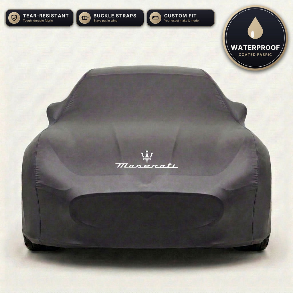Black Maserati outdoor car cover, waterproof and custom fit, with printed Maserati logo