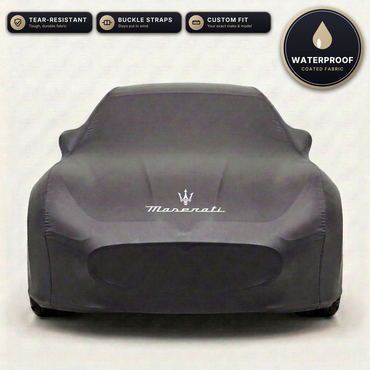 Black Maserati outdoor car cover, waterproof and custom fit, with printed Maserati logo