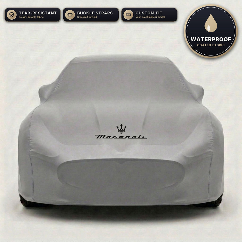 Gray Maserati outdoor car cover, waterproof and custom fit, with printed Maserati logo