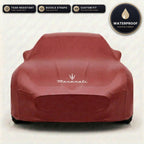 Red Maserati outdoor car cover, waterproof and custom fit, with printed Maserati logo