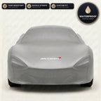 Gray McLaren outdoor car cover, waterproof and custom fit, with printed McLaren logo