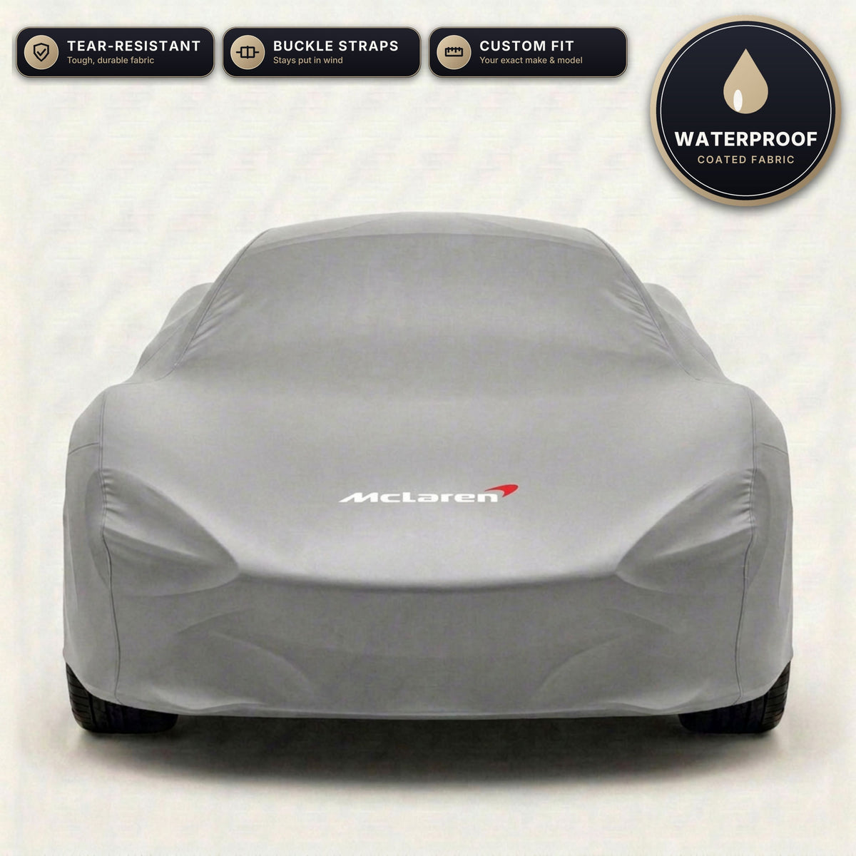 Gray McLaren outdoor car cover, waterproof and custom fit, with printed McLaren logo