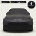 Black Mercedes-Benz outdoor car cover, waterproof and custom fit, with printed Mercedes-Benz logo