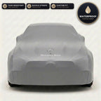 Gray Mercedes-Benz outdoor car cover, waterproof and custom fit, with printed Mercedes-Benz logo